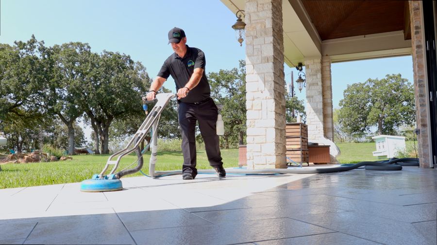 Clean Master technician cleaning tile